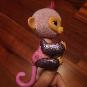 Fingerlings Interactive Baby Monkey Charli Purple, 70+ Sounds Reactions
